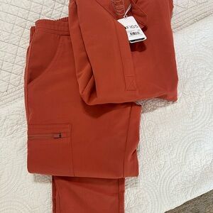 Figs Women's scrubs set in gorgeous Terra Cotta—XXS top and XS tall pants